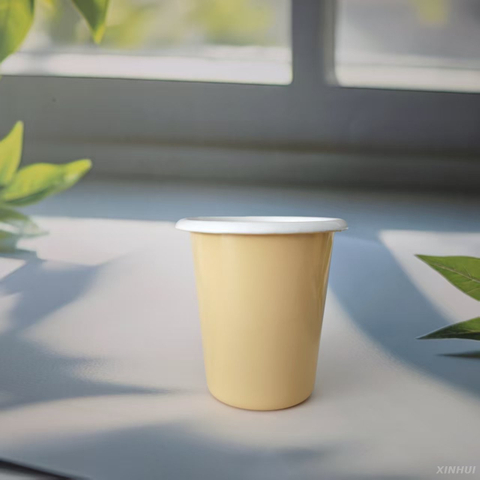 Pastel Yellow Enamel Mug – Minimalist Coffee Cup, Soft Yellow Tone, Perfect for Home, Office or as a Gift, Natural Light Setting 